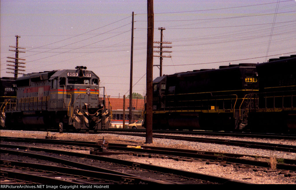 SBD 3630 leads its train past SBD 8019